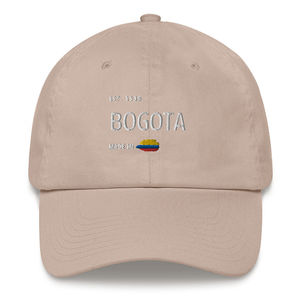 Classic stone-colored dad hat with 'Bogotá' embroidery, featuring 'Made in Colombia' and the Colombian flag detail. A stylish tribute to Colombia’s capital.