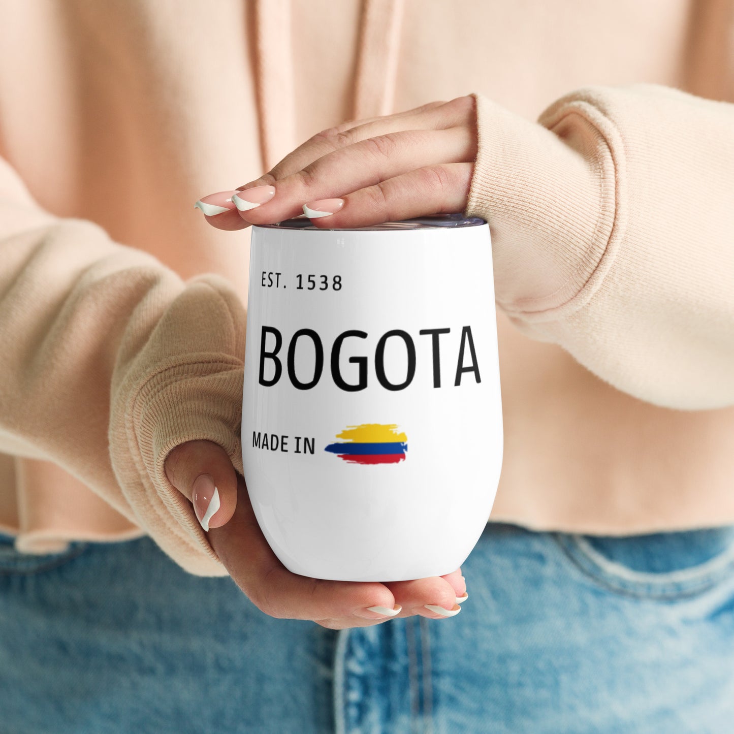 White insulated stainless steel wine tumbler featuring 'Bogotá' and 'Made in Colombia' with a small Colombian flag design. Double-walled to keep beverages at the perfect temperature.