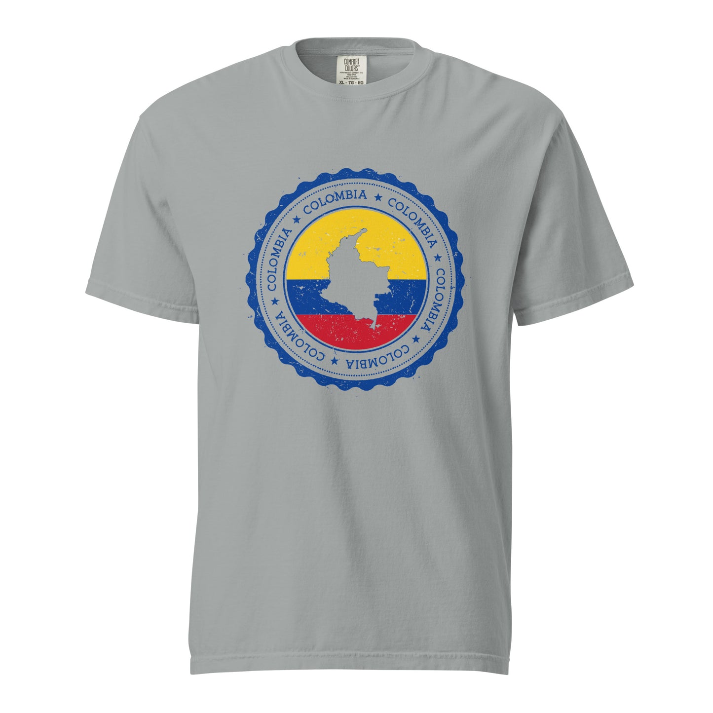 Granite-colored unisex heavyweight T-shirt featuring a circular Colombian heritage design with bold yellow, blue, and red accents, showcasing cultural pride and style.
