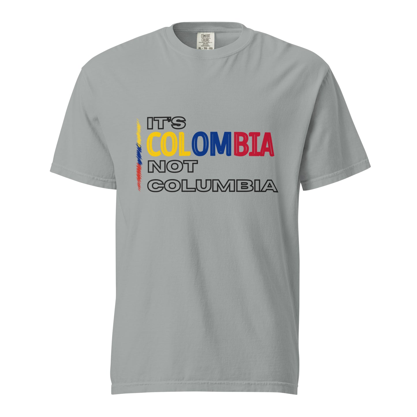 heavyweight t-shirt with bold text saying 'It's Colombia Not Columbia' in blue, yellow, and red. A statement piece for Colombian pride.