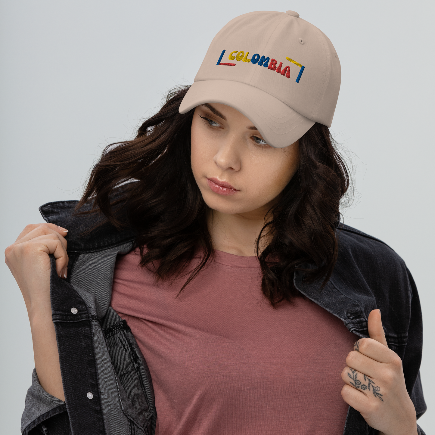 Classic Stone dad hat featuring a colorful 'COLOMBIA' text design in yellow, blue, and red, inspired by the Colombian flag.