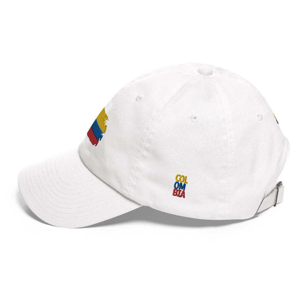 Classic white dad hat featuring an embroidered Colombian flag brushstroke design. A stylish and subtle way to represent Colombian pride with a modern artistic touch