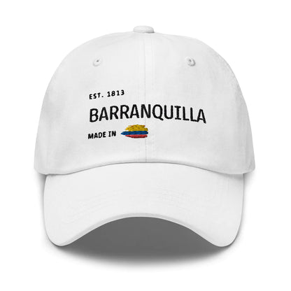 White dad hat featuring 'Barranquilla - Made in Colombia' embroidered design with a small Colombian flag. A stylish and minimal cap celebrating Barranquilla rich heritage and culture.