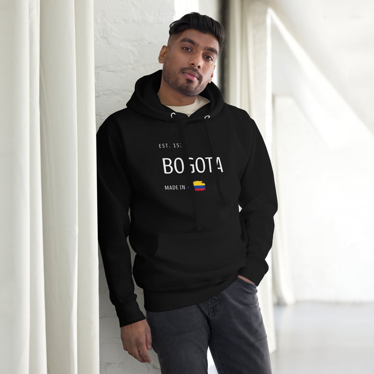 Unisex Black premium hoodie featuring 'EST. 1538 BOGOTÁ' with a Colombian flag, symbolizing the rich culture and history of Bogotá, Colombia.