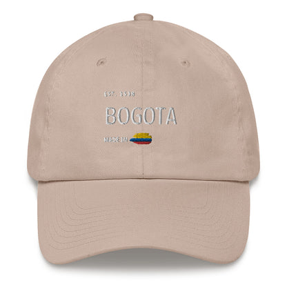 Classic stone-colored dad hat with 'Bogotá' embroidery, featuring 'Made in Colombia' and the Colombian flag detail. A stylish tribute to Colombia’s capital.
