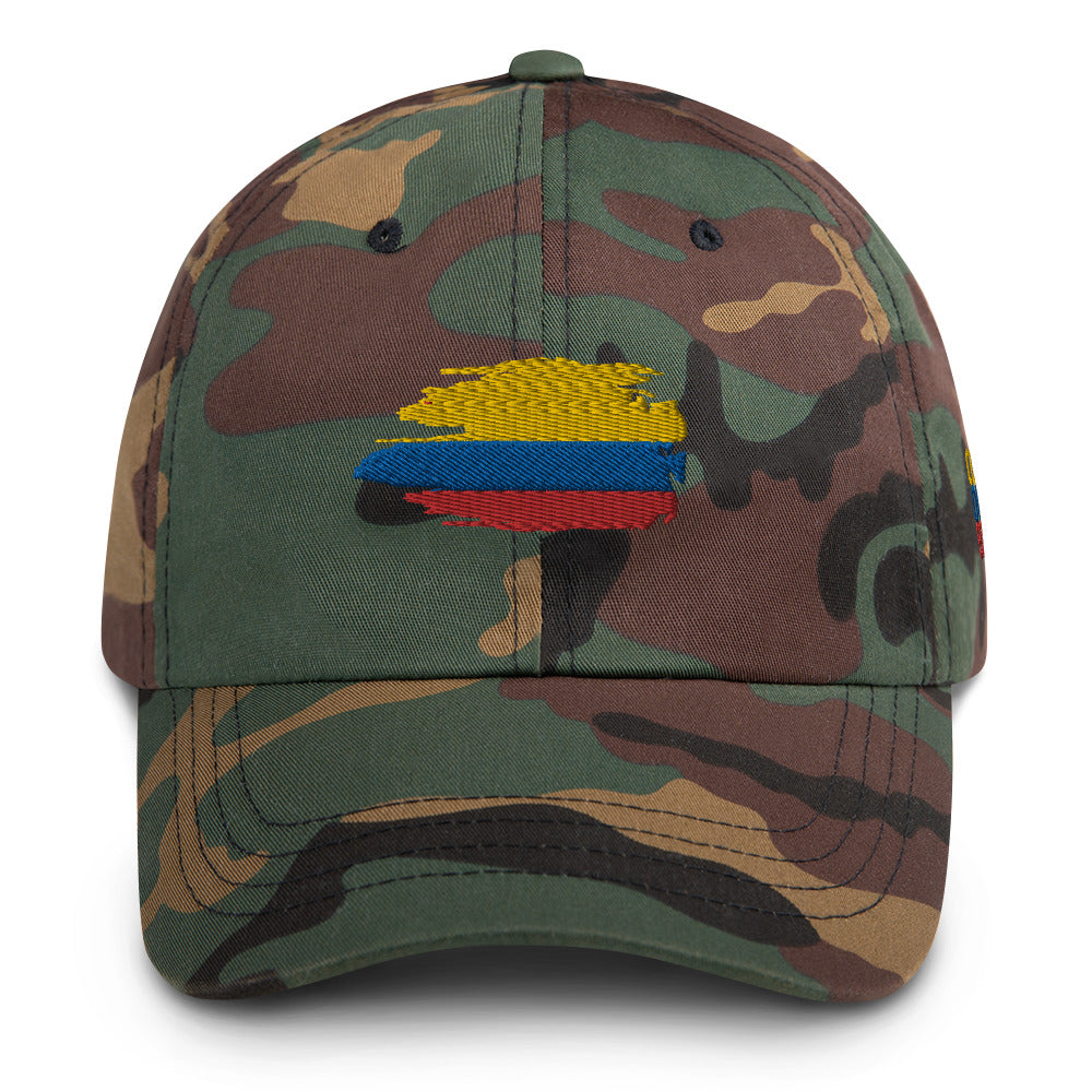 Classic green camo dad hat featuring an embroidered Colombian flag brushstroke design. A rugged and stylish way to showcase Colombian pride with a military-inspired look.