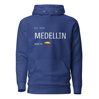 Team Royal premium hoodie featuring 'Medellín' text, 'EST. 1616,' and a small Colombian flag design. A cozy and stylish tribute to Medellín, Colombia.