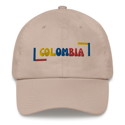 Classic Stone dad hat featuring a colorful 'COLOMBIA' text design in yellow, blue, and red, inspired by the Colombian flag.