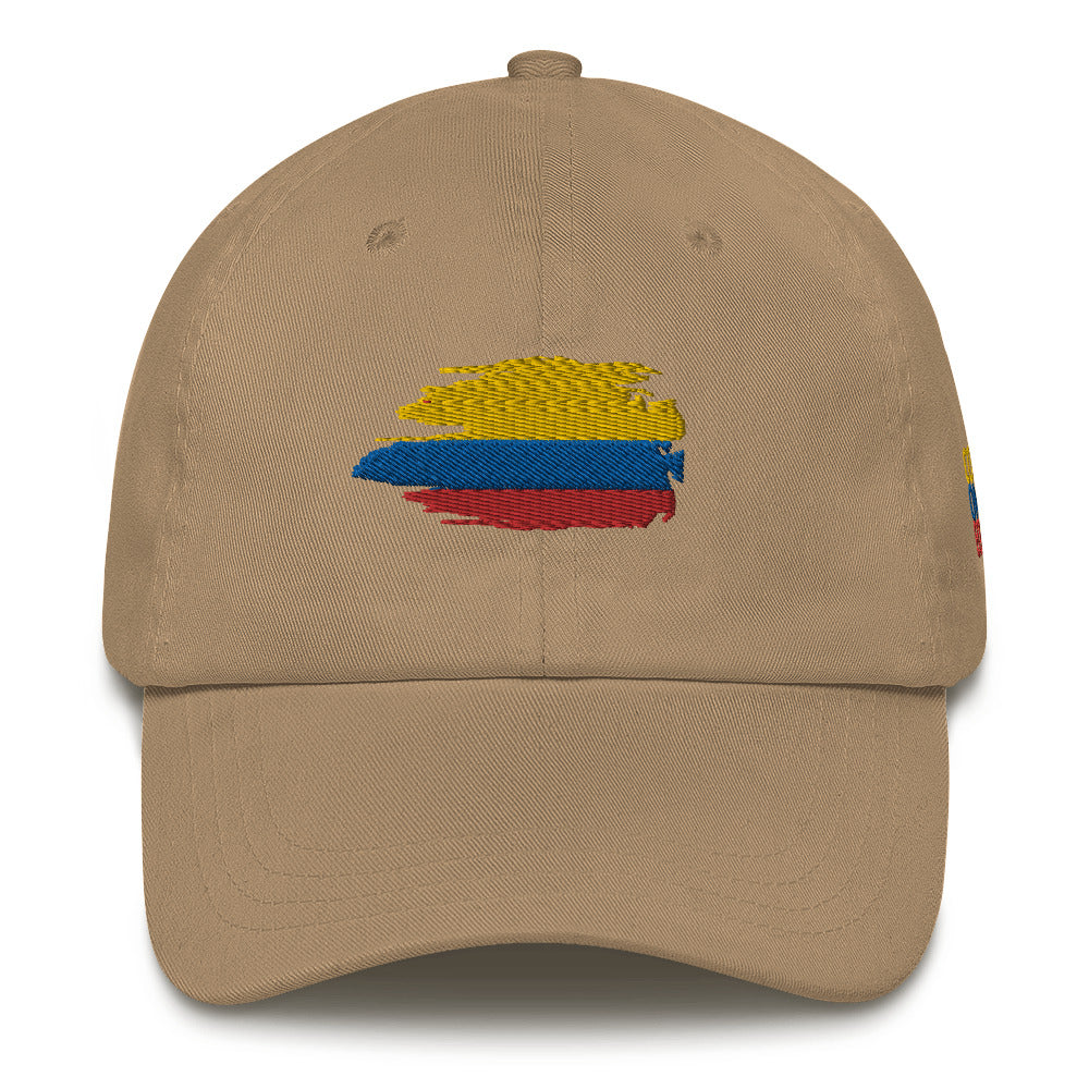Classic Khaki dad hat featuring an embroidered Colombian flag brushstroke design. A stylish and subtle way to represent Colombian pride with a modern artistic touch