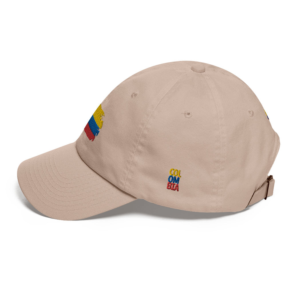 Classic Stone dad hat featuring an embroidered Colombian flag brushstroke design. A stylish and subtle way to represent Colombian pride with a modern artistic touch.